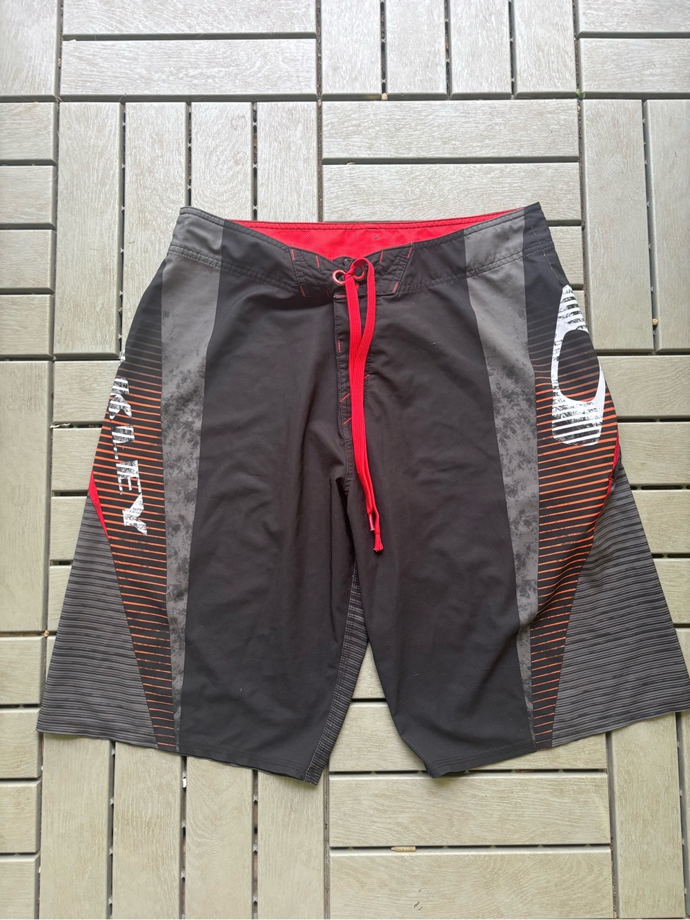 Oakley Black Board Shorts with Red Accent Drawstring